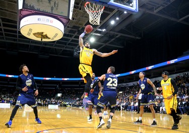 Julian Boyd of the Lightning gets a big dunk late in the game against the St. John's Edge as the Lightning won 106-101 in a hard fought battle at Budweiser Gardens on Sunday April 29, 2018. The Lightning won the series 4-2 and will now face Halifax for the NBL championship. Mike Hensen/The London Free Press/Postmedia Networki