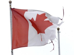 London Free Press file photo shows the Canadian flag at a London business in 2010