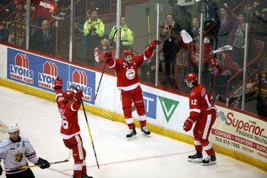 Sault Ste. Marie Greyhounds Morgan Frost and Taylor Raddysh celebrate Boris Katchouk's second goal against the Owen Sound Attack during Game 7 of their OHL Western Conference semifinal Tuesday at Essar Centre in Sault Ste. Marie. The Greyhounds won 9-7 to clinch the series. Greg Cowan/The Sun Times