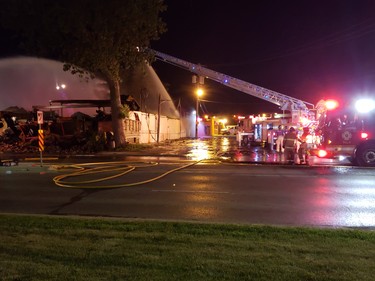 Firefighters still on scene at Hooks restaurant at midnight Tuesday. (London Free Press photo)
