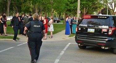 After the Festival Theatre was evacuated Monday night, police set up a perimeter around the property, keeping pedestrians and traffic back as far as Water Street and Lakeside Drive. Galen Simmons/The Beacon Herald/Postmedia Network