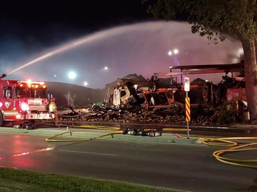 Firefighters still on scene at Hooks restaurant at midnight Tuesday. (London Free Press photo)