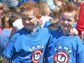 Twins Carter Vanderzwart, left, and Carson Vanderzwart, then 5, at Camp U-Turn in 2012. The Wallaceburg summer camp program has been denied funding this year because organizers wouldn’t agree with a federally mandated attestation in the application form that it believed contradicts its Christian principles. (David Gough/Postmedia Network)