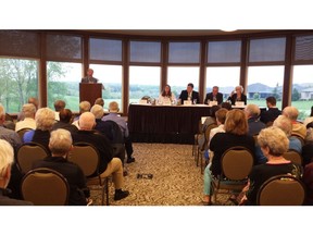 Candidates gather for Tuesday evening’s all-candidates debate at RiverBend Golf Course. From left: moderator Ron Holliday, Green candidate Pamela Reid, PC candidate Andrew Lawton, Liberal candidate Jonathan Hughes and incumbent New Democrat Peggy Sattler. (DAN BROWN, The London Free Press)