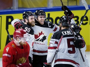 Canada's Ryan O'Reilly celebrates after scoring leading to Canada winning the Ice Hockey World Championships quarterfinal match against Russia in Copenhagen, Denmark, Thursday, May 17, 2018. (Liselotte Sabroe/Ritzau Scanpix via AP)
