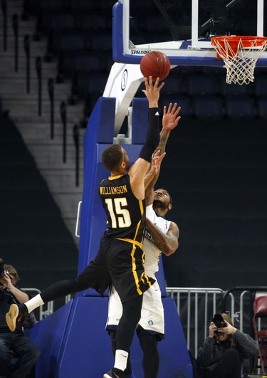 London Lightning’s Garrett Williamson goes up against the defence of Halifax Hurricanes’ Tyrone Watson in Game 2 of the National Basketball League of Canada best-of-seven final Tuesday in Halifax. The Hurricanes won 100-91 to take a 2-0 series lead.
ERIC WYNNE/Chronicle Herald