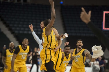 The London Lightning celebrate their 109-101 victory over the Halifax Hurricanes in Game 7 of the NBL Canada finals.
(RYAN TAPLIN / The Chronicle Herald)