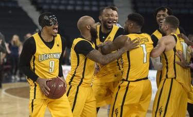 The London Lightning celebrate their 109-101 victory over the Halifax Hurricanes in Game 7 of the NBL Canada finals.
(RYAN TAPLIN / The Chronicle Herald)