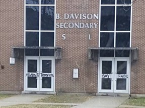 Two males, ages 15 and 16, were charged with mischief under $5,000 in April 2017 after B. Davison secondary school was defaced with racist and homophobic graffiti. (Facebook photo)