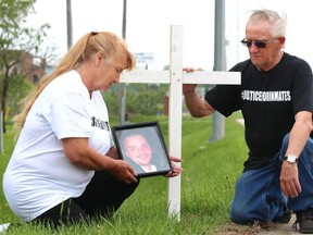 Roger and Janice Pigeau, whose son, James, 29, died in the Elgin-Middlesex Detention Centre on Dec. 26, 2017, are holding a protest outside the London jail on June 3. (DALE CARRUTHERS, The London Free Press)