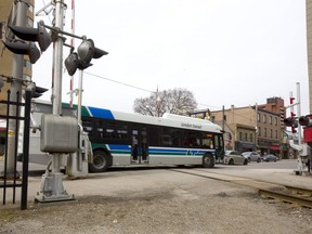 Buses crossing the Richmond Street CP Rail crossing in London. London Free Press file photo