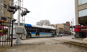 Buses crossing the Richmond Street CP Rail crossing in London. London Free Press file photo