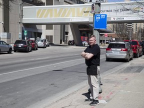 Gourmet Deli owner Thomas Sandick says he is losing $3,000 in sales  per month because the city has replaced King St. parking spots in front of the eatery with a bus stop. (DEREK RUTTAN, The London Free Press)