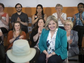 Provincial NDP leader Andrea Horwath is applauded at her town hall meeting on health care in London on Tuesday. (Derek Ruttan/The London Free Press)