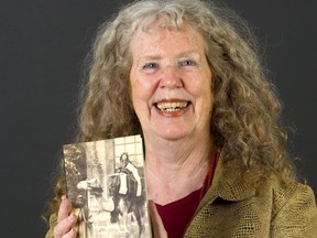 London poet Penn Kemp with her new book Local Heroes.  (Mike Hensen/The London Free Press)