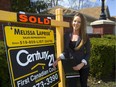 Melissa Laprise a Century 21 representative says there's a sellers market for homes under the $400,000 range in London, Ont.  (MIKE HENSEN, The London Free Press)