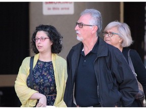 Melissa Facciolo leaves the London courthouse with her family on Tuesday. Facciolo, whose husband Samuel Maloney was killed in a police raid on Dec. 23, 2016, pleaded guilty to possession of a prohibited weapon and was given 12 months probation as part of a conditional discharge. Seven other charges against Facciolo were withdrawn. DALE CARRUTHERS / THE LONDON FREE PRESS