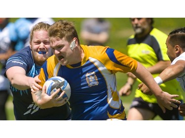 Lucas Vikings' Nathan Brooks tackles Beal Raiders' Bailey Lynch in a Thames Valley varsity boys rugby match Tuesday at Lucas. Lucas won 27-7.  (Mike Hensen/The London Free Press)