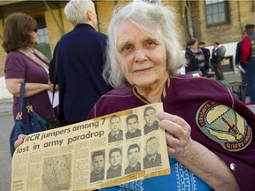 Lynette Riddell holds a newspaper clipping Tuesday from 50 years ago, that details the loss of seven paratroopers, including Master Warrant Officer Reg Riddell, her husband. In the largest peacetime loss, seven paratroopers died on a night jump near Petawawa when a wind shift pushed them into the Ottawa River. A memorial was held Tuesday May 8, 2018 at the RCR cenotaph in Wolseley Barracks.  Mike Hensen/The London Free Press