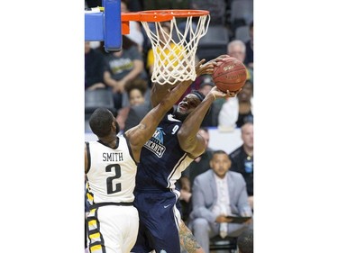 Rhamel Brown of the Halifax Hurricanes shoots over Ashton Smith of the London Lightning during Game 3 of their NBL of Canada championship series in London, Ont. on Thursday May 10, 2018. (Derek Ruttan/The London Free Press)
