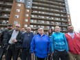 These residents of 241 Simcoe St.— Cody Pearson, Ray Ernst, Justin Collins, Mike Lund, Darryl Mollard, Christina Mollard, Ron Bell, Ken Robb, Kimberley Ermitage and Dave Lunquist — are opposed to having a supervised street drug injection site in their apartment building.  (DEREK RUTTAN, The London Free Press)