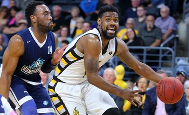 Kyle Johnson of the Lightning drives baseline around Antoine Mason of the Halifax Hurricanes during the first half of game four of the NBL finals at Budweiser Gardens in London, Ont. 
Photograph taken on Saturday May 12, 2018. 
Mike Hensen/The London Free Press/Postmedia Network