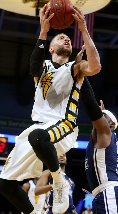 Garrett Williamson of the Lightning drives to the hoop past Ta'Quan Zimmerman of the Halifax Hurricanes during the first half of game four of the NBL finals at Budweiser Gardens in London, Ont. 
Photograph taken on Saturday May 12, 2018. 
Mike Hensen/The London Free Press/Postmedia Network