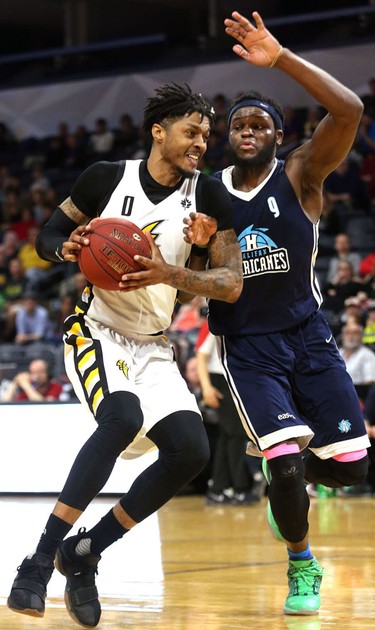 Mo Bolden of the Lightning drives to the hoop on Rhamel Brown of the Halifax Hurricanes during the first half of game four of the NBL finals at Budweiser Gardens in London, Ont. 
Photograph taken on Saturday May 12, 2018. 
Mike Hensen/The London Free Press/Postmedia Network