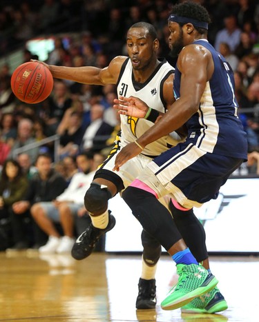 Kirk Williams Jr of the Lightning works hard inside being guarded by Rhamel Brown of the Halifax Hurricanes during the first half of game four of the NBL finals at Budweiser Gardens in London, Ont. 
Photograph taken on Saturday May 12, 2018. 
Mike Hensen/The London Free Press/Postmedia Network