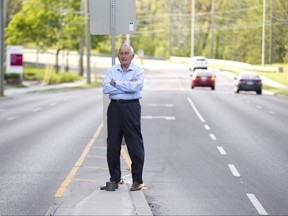 Walter Lonc in the middle of Richmond Road in the north end of London. Derek Ruttan/The London Free Press/Postmedia Network