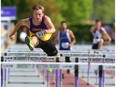 Liam Mather of London Central wins his heat in the senior boys 110m hurdles on Thursday, the first day of WOSSAA track and field at TD stadium in London. Mather, who won gold at OFSAA last year in the event, hopes to go to the IAAF world juniors this summer in Finland. Mike Hensen/The London Free Press