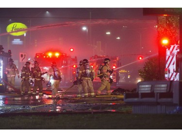 Firefighters work on the fire that destroyed the former Hooks Restaurant in London, Ont. on Wednesday May 30, 2018. Derek Ruttan/The London Free Press/Postmedia Network