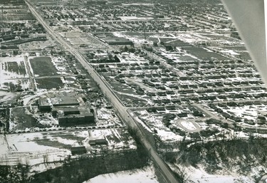 Aerial looking south of Highbury and Fuller, two blocks north of Huron Street, shown is Montcalm Secondary School, Huron Heights and Northland Shopping centres located nearby, 1969. (London Free Press files)