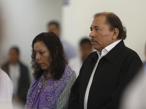 Nicaragua's President Daniel Ortega and Vice-President Rosario Murillo attend the opening of a national dialogue in Managua, Nicaragua, earlier this month. (Alfredo Zuniga/The Associated Press)