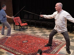 Zoltan played by Peter Luscombe, and John Krisak as Dariusz star in Arbitrary Angle Theatre's production of Point of Honour, onstage until Saturday at the Palace Theatre's Procunier Hall.