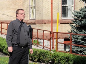 John Paul Stone walks towards the Perth County Courthouse on Wednesday in Stratford, Ont. Terry Bridge/Stratford Beacon Herald/Postmedia Network