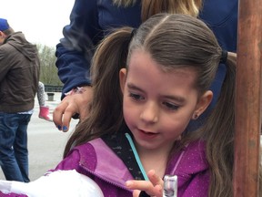 Lillianna Jones, 6, of London, learns about dry ice bubbles at Science Rendezvous held May 12 at Western University.