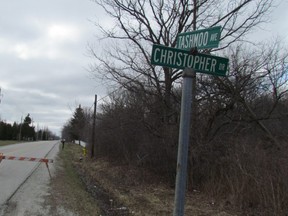 Barricades block Tashmoo Avenue, from Christopher Street to LaSalle Line, on March 26, 2016 on the Aamjiwnaang First Nation at Sarnia after  the body of Jonathan Patrick Pike, 26, of Sarnia was found in a wooden area west of Tashmoo Avenue. (Postmedia Network)