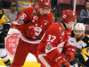 Soo Greyhounds players Morgan Frost and Ryan Roth and Hamilton Bulldogs opponent Ryan Moore scramble for the puck during the first period of Game 2 of the OHL championship at Essar Centre on May 5, 2018. (BRIAN KELLY/THE SAULT STAR/POSTMEDIA NETWORK)