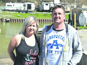 Sam Edwards, left, and her husband Greg Edwards own the North Erie Marina in Port Bruce. They are worried about a plan for a temporary bridge to be built at the end of Bank Street, one they say will scuttle their business. (Louis Pin/Times-Journal)