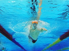 Kenny Dickens, 17, from the Windsor Aquatic Club competes in the Western Ontario Swim Association Short Course Regional Championship at the Windsor Aquatic Centre on Feb. 6, 2014.