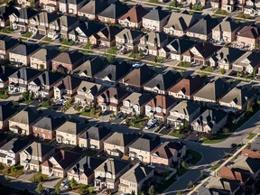 Homes stand in this aerial photograph taken above Toronto.