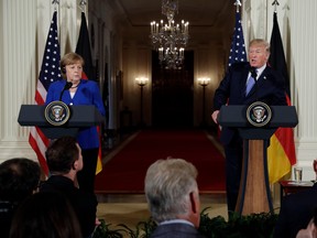 President Donald Trump speaks during a news conference with German Chancellor Angela Merkel in the East Room of the White House in Washington. The presidential news conference, a time-honored tradition going back generations, appears to be no longer. Instead, the president engages the press in more informal settings that aides say offer reporters far more access, more often, than past administrations.  (AP Photo)