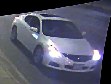 The white car, believed to be a Nissan Altima, in which a homicide suspect fled early Saturday morning.