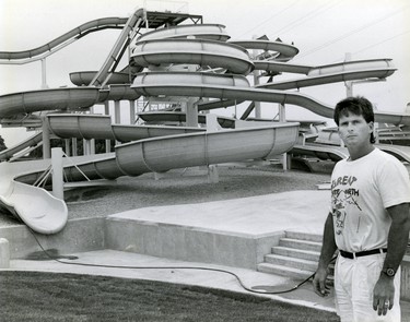 Wallyworld owner Walt Spivak stands in front of 5 chute water slide, 1987.  (London Free Press files)