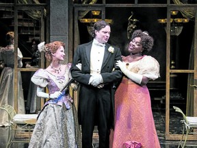 From left, Jonelle Gunderson plays Mrs. Margaret Marchmont, Brad Hodder is Lord Arthur Goring and Dejah Dixon-Green is Lady Olivia Basildon in the Stratford Festival production of An Ideal Husband. (Emily Cooper/Stratford Festival)