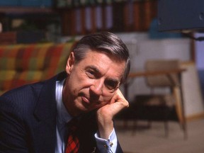 This image released by Focus Features shows Fred Rogers on the set of his show Mister Rogers Neighborhood from the documentary film, Won't You Be My Neighbor? (Jim Judkis/Focus Features via AP)