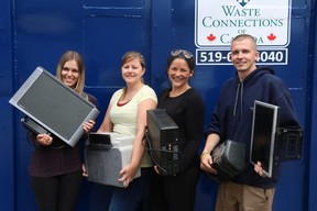 Kelsey Campagna (left), Erin Logie, Emily Bell and Ben Cowderoy hold some electronics brought to Budweiser Gardens on Sunday for their electronic recycling event. Londoners could drop off old and unwanted electronics and event partner Waste Connections of Canada will later recycle and dispose the items in an environmentally friendly way. A shredding truck was also available on site. “London has turned out in an amazing fashion," said Kelly Austin, marketing director for Budweiser Gardens. "We’ve been really happy with all the people coming to this event." (SHANNON COULTER, The London Free Press)