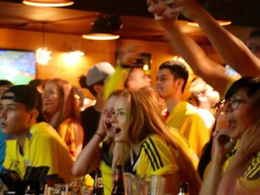 Columbian fans sit on the edge of their seats as they watch Columbia take on Poland in the 2018 FIFA World Cup tournament in Russia. (SHANNON COULTER, The London Free Press)