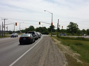 Traffic lines up Tuesday afternoon where Glendon Drive intersects with Vanneck Road on the right. Coldsteam Road enters the intersection on the extreme right. The quirky roadway is known to locals as "Five Corners." (DAN BROWN, The London Free Press)